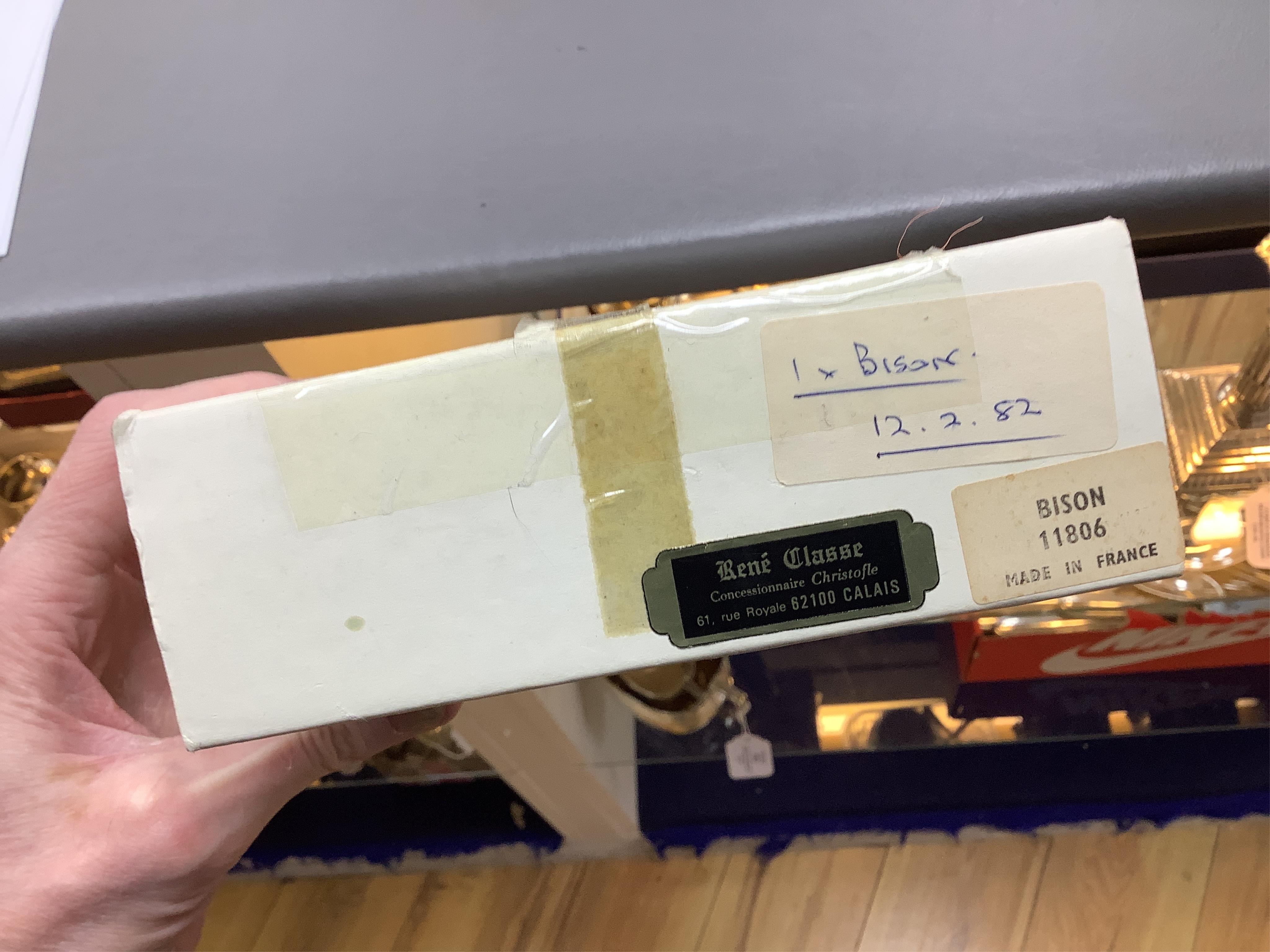 A Lalique crystal frosted glass Bison on polished clear glass paperweight paperweight (boxed), 12cm wide x 10cm high